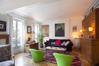 Living room in Appartement typiquement parisien déco bohème - 1