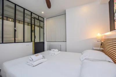 Bedroom in Très bel appartement design à St-Marcel - 17