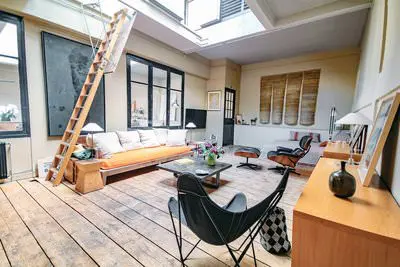 Living room in Atelier lumineux et design à Paris - 2