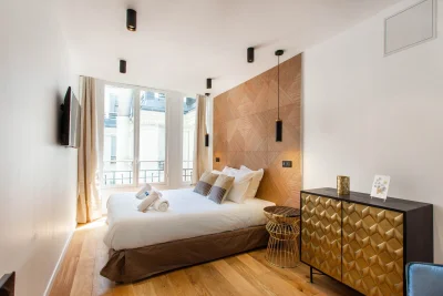 Dormitorio dentro Bel appartement design aux Champs-Elysées - 4